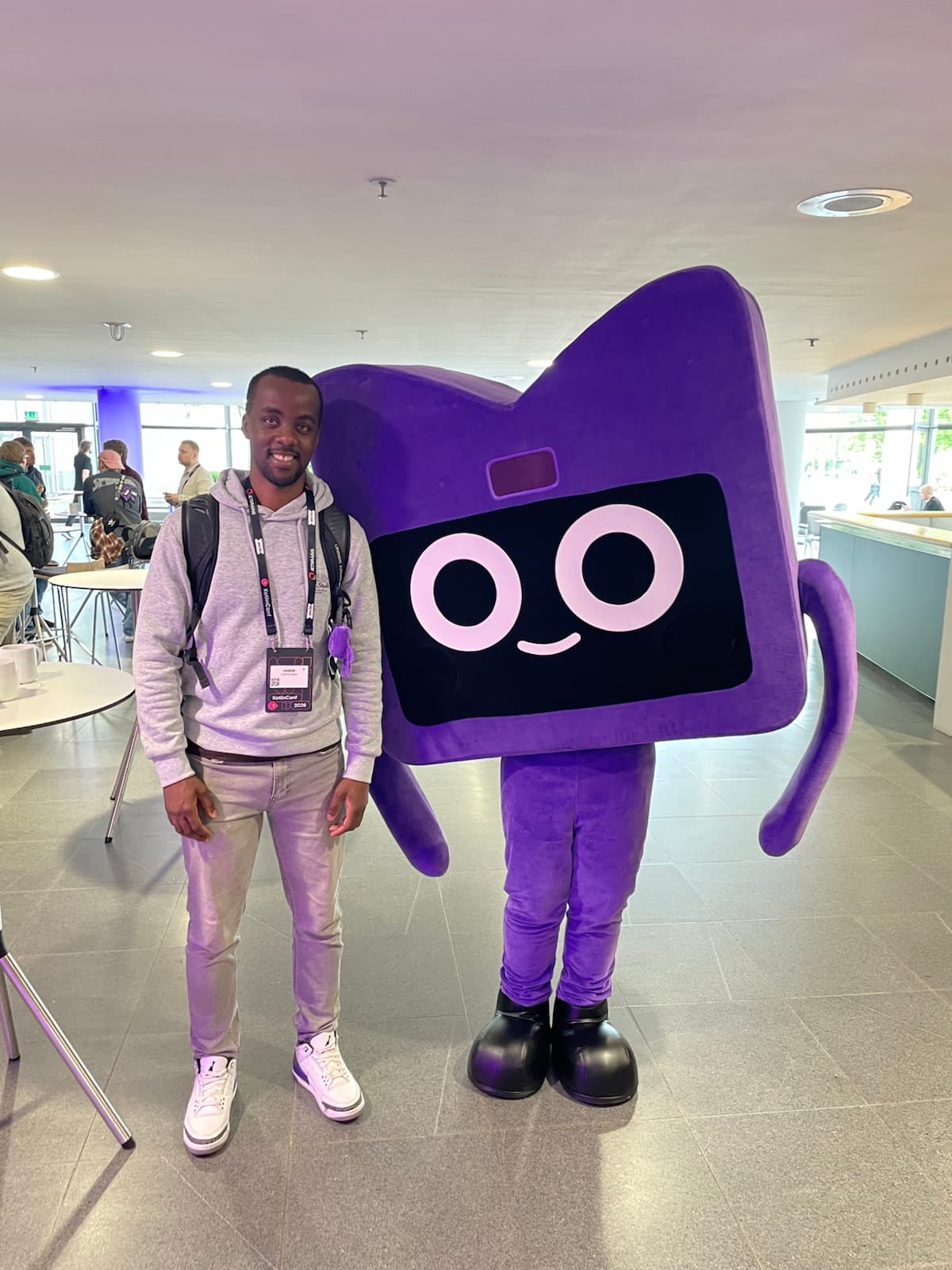 Oreste Gabo with the Kodee mascot at KotlinConf 2026